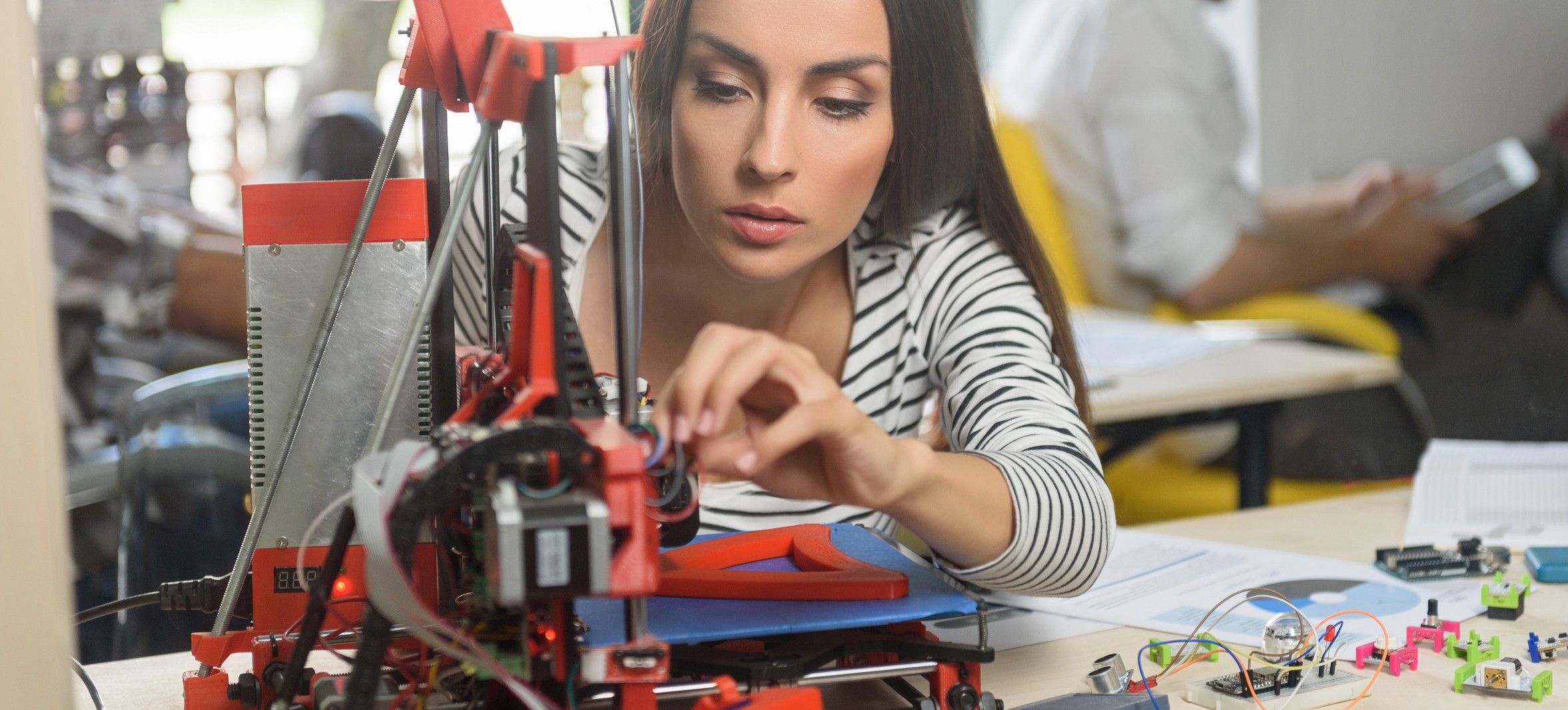 Professional female engineer working with 3d printing